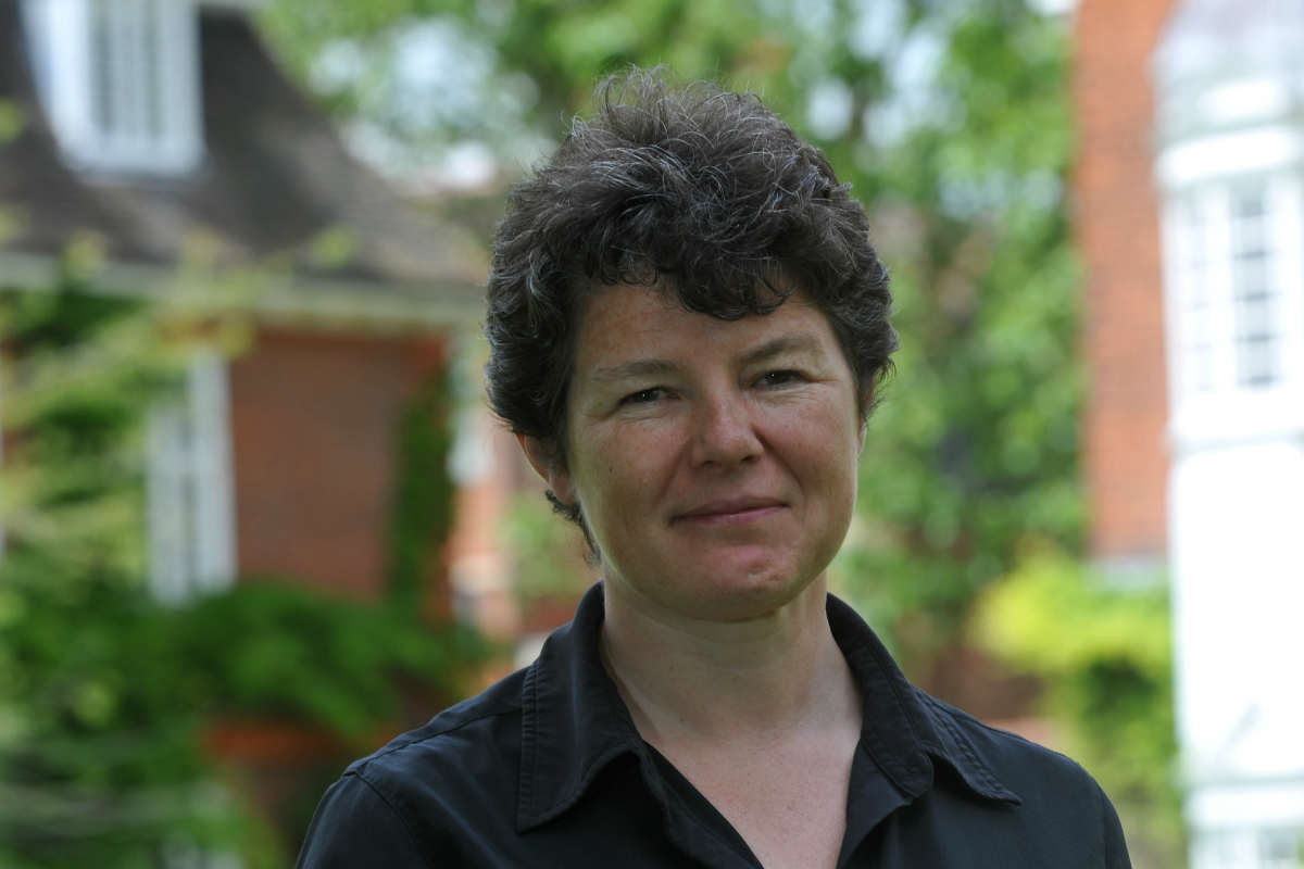 Dr Emma Mawdsley in the gardens at Newnham