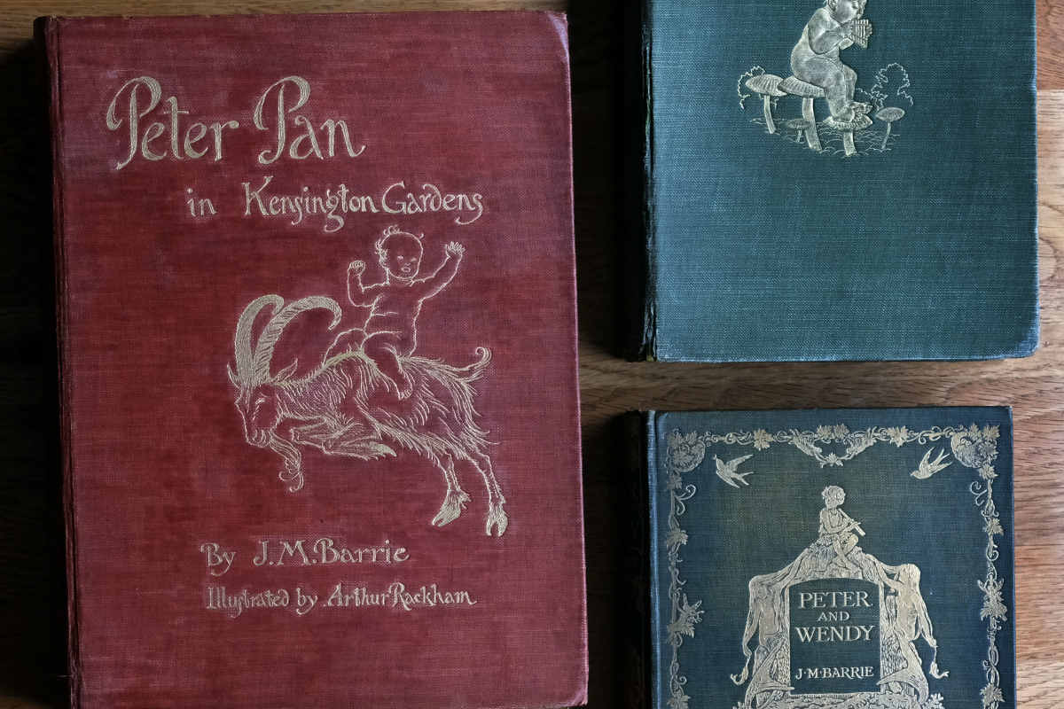 An image of early editions of Peter Pan book