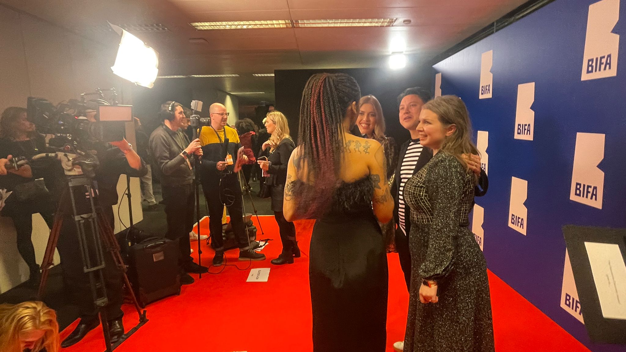 Zoe Howe and colleagues in front of film cameras