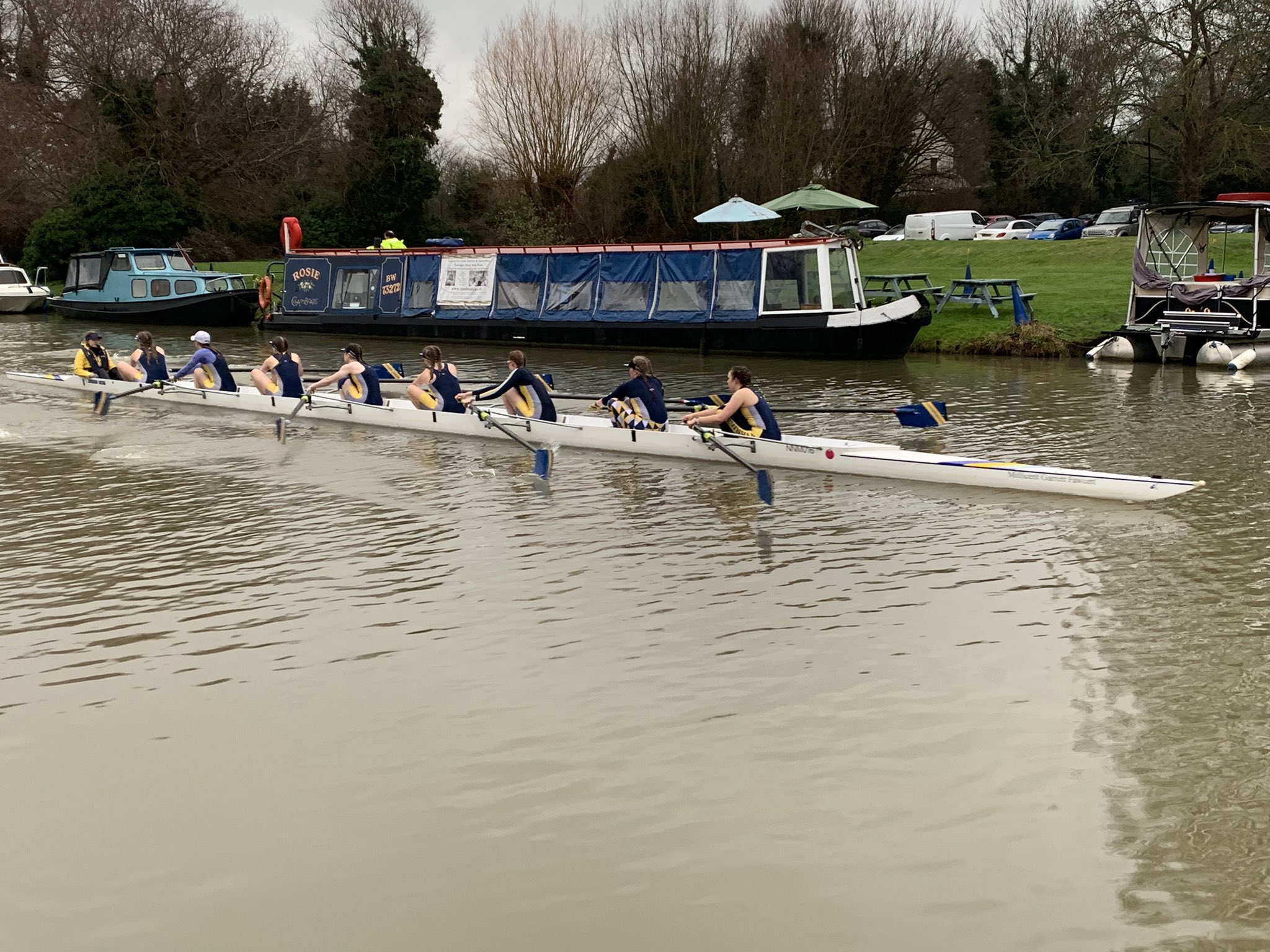 Boat crew rowing on the Cam